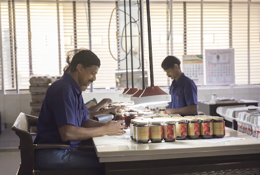 Workers sorting products